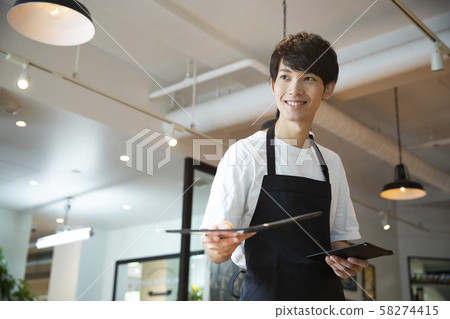 Male cafe clerk Male cafe clerk 58274415