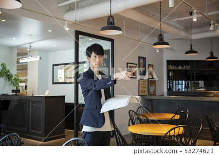 Male Architect Architect writing blueprint Male Architect Architect writing blueprint 58274621