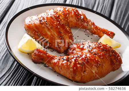 Grilled chicken quarter legs in honey-tomato Grilled chicken quarter legs in honey-tomato 58274636