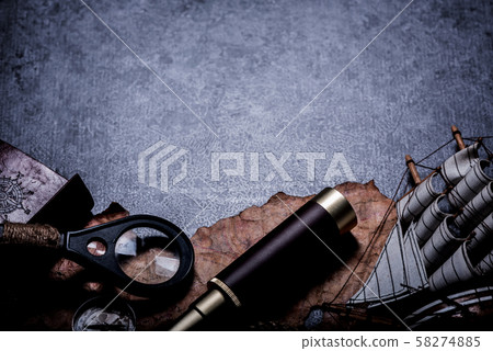 Columbus Day. Pirates and treasure with worldmap Columbus Day. Pirates and treasure with worldmap 58274885