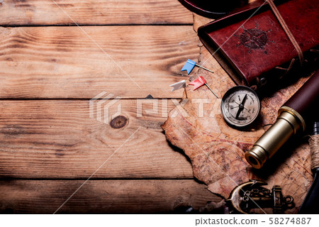 Columbus Day. Pirates and treasure with worldmap Columbus Day. Pirates and treasure with worldmap 58274887