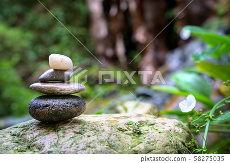 Stacked pebbles in the garden. Zen, spa or 58275035