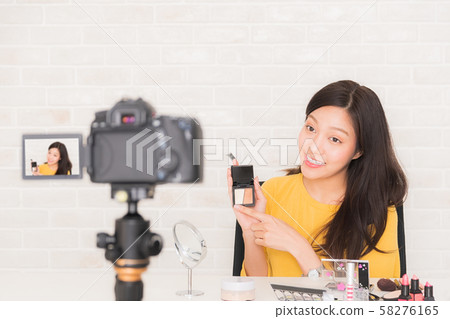 Beauty blogger at social video live. 58276165