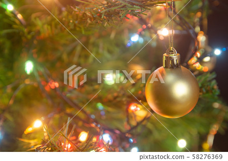 Christmas decoration. Hanging gold balls on pine Christmas decoration. Hanging gold balls on pine 58276369