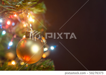 Christmas decoration. Hanging gold balls on pine Christmas decoration. Hanging gold balls on pine 58276373