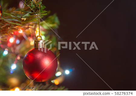 Christmas decoration. Hanging red balls on pine Christmas decoration. Hanging red balls on pine 58276374