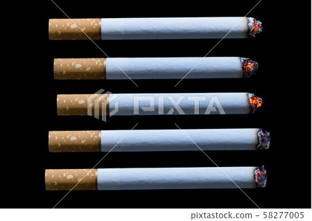 Cigarette burning isolated on black background Cigarette burning isolated on black background 58277005