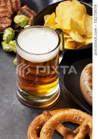 Oktoberfest set. Pretzels, sausages and lager beer Oktoberfest set. Pretzels, sausages and lager beer 58278659
