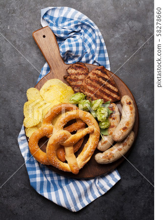 Oktoberfest set. Pretzels, sausages and chips Oktoberfest set. Pretzels, sausages and chips 58278660