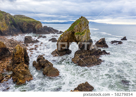 Aerial view of the Crohy Head Sea Arch, County Donegal - Ireland 58279854
