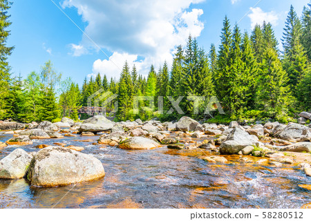 Jizera river full of granite rocks on sunny summer day, Jizera Mountains, Czech Republic 58280512