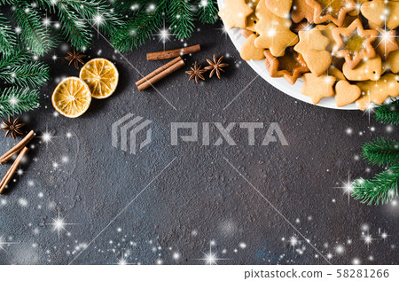 Christmas and culinary background with a plate of freshly baked Christmas gingerbread. Christmas and culinary background with a plate of freshly baked Christmas gingerbread. 58281266