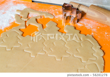 The process of making cookies and Christmas gingerbread at home. The process of making cookies and Christmas gingerbread at home. 58281278