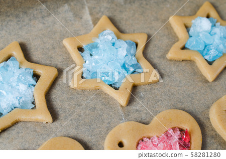 The process of making cookies and Christmas gingerbread at home. The process of making cookies and Christmas gingerbread at home. 58281280