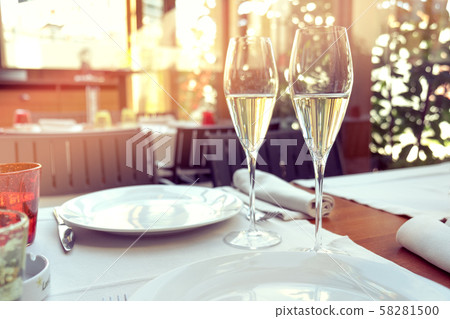 two glasses of tasty white wine at a restaurant 58281500