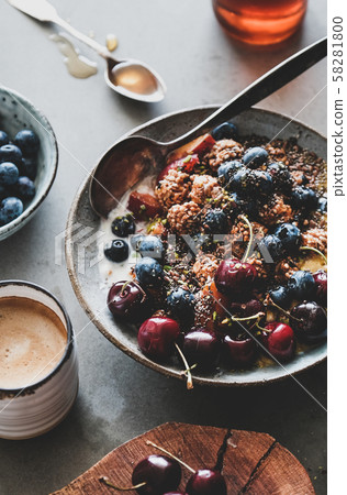 Healthy vegetarian breakfast with quinoa granola Healthy vegetarian breakfast with quinoa granola 58281800