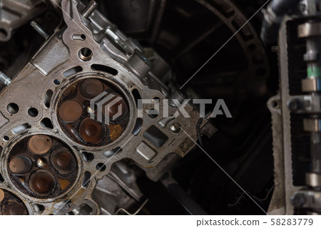 Disassembled car dirty engine cylinder at garage Disassembled car dirty engine cylinder at garage 58283779
