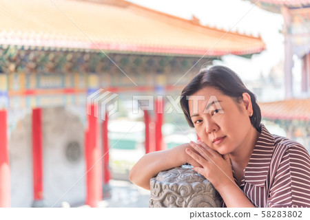 Woman at Wat Boromracha Kanchanapisek Anusorn 58283802