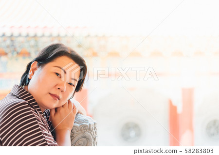 Woman at Wat Boromracha Kanchanapisek Anusorn 58283803