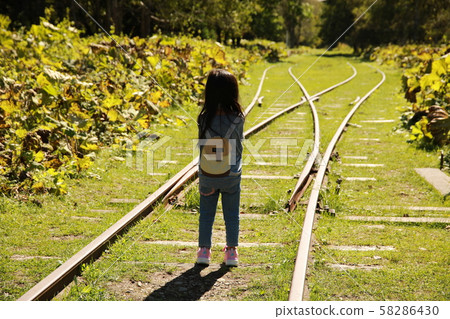 Old Horoka Station abandoned line and girl Old Horoka Station abandoned line and girl 58286430
