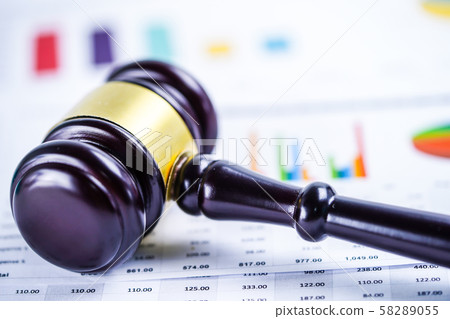 Judge hammer on chart graph paper 58289055