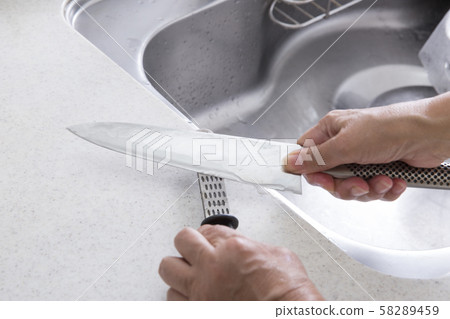 Knife sharpening Knife sharpening 58289459