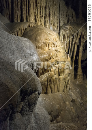 Ancient cave with stalactites and stalagmites 58291036