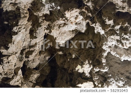 Ancient cave with stalactites and stalagmites 58291043