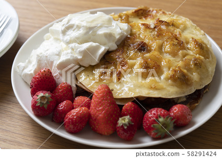 Banana pancakes with salmon and drained yogurt 58291424