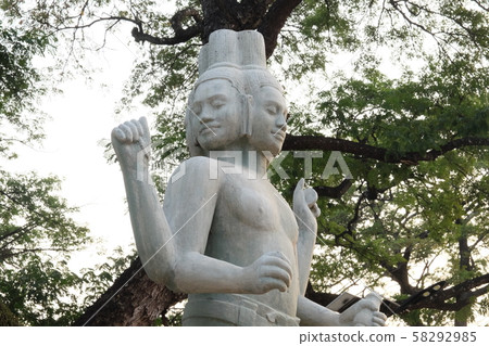 Sculpture of a four-armed Hindu deity. Sculpture of a four-armed Hindu deity. 58292985