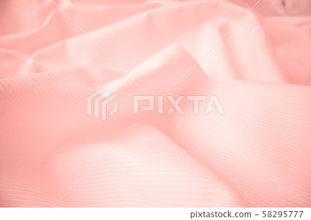 Shiny flowing cloth texture in macro shot. Shiny flowing cloth texture in macro shot. 58295777