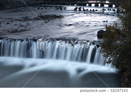 Jiktang Falls with white water streams Jiktang Falls with white water streams 58297143