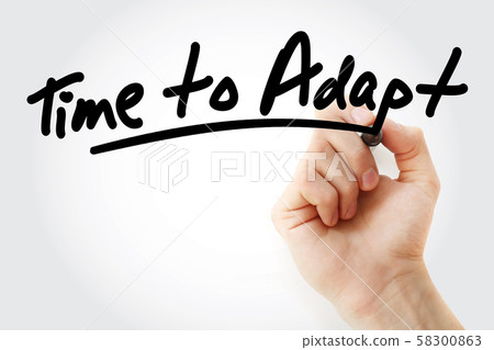 Hand writing Time to Adapt with marker 58300863