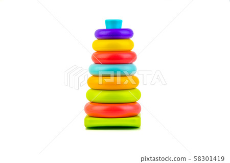 Plastic toy pyramid on a white background. Games Plastic toy pyramid on a white background. Games 58301419