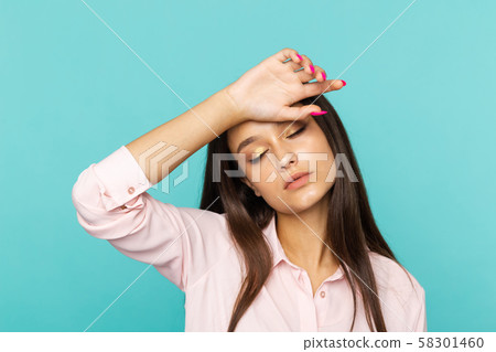 Sad and exhausted female person isolated in the studio. Sad and exhausted female person isolated in the studio. 58301460