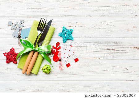 New year set of fork and knife on napkin. Top view 58302007