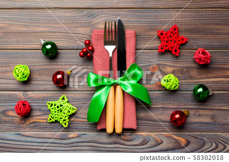 Top view of holiday set of fork and knife on Top view of holiday set of fork and knife on 58302018