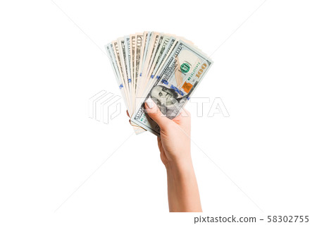 Top view of isolated female hand holding a fan of Top view of isolated female hand holding a fan of 58302755