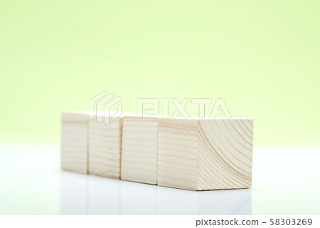 Wooden block toy on the table 58303269