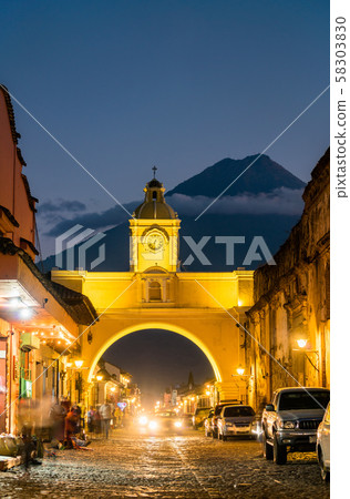 Arco de Santa Catalina and Volcan de Agua in Antigua Guatemala, Central America 58303830