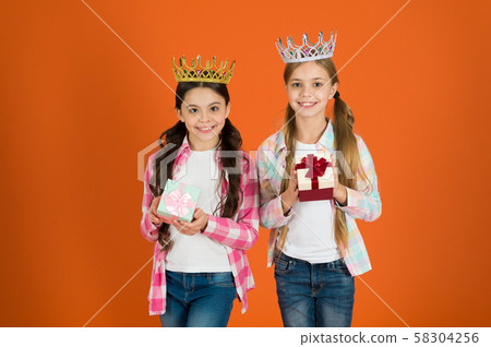 Egocentric princess. Kids wear golden crowns 58304256