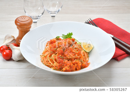 Pasta with seafood ragout sauce. This is a ragout sauce (tomato) made of red snapper, shrimp and scallop mince. 58305267