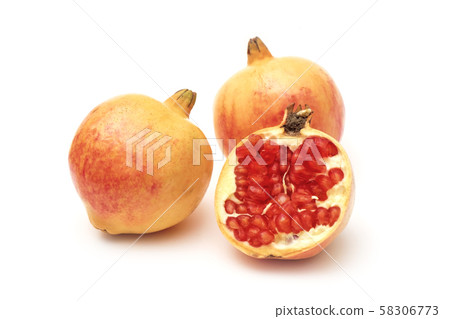 Ripe and Fresh Pomegranate Fruit on iSolated White Ripe and Fresh Pomegranate Fruit on iSolated White 58306773