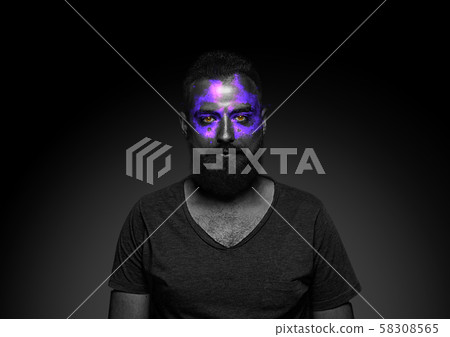 Close up portrait of young man isolated on black studio background Close up portrait of young man isolated on black studio background 58308565