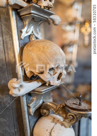 Human skulls and bones in ossuary Sedlec Kostnice 58310785
