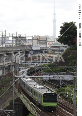 Yamanote Line E235 series going around Tabata Yamanote Line E235 series going around Tabata 58311768