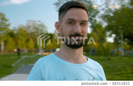 Portrait of a man on blurred background Portrait of a man on blurred background 58311831
