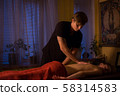 Body massage and spa treatment in modern salon 58314583