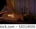 Body massage and spa treatment in modern salon 58314606