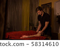 Spa facial massage for woman client 58314610